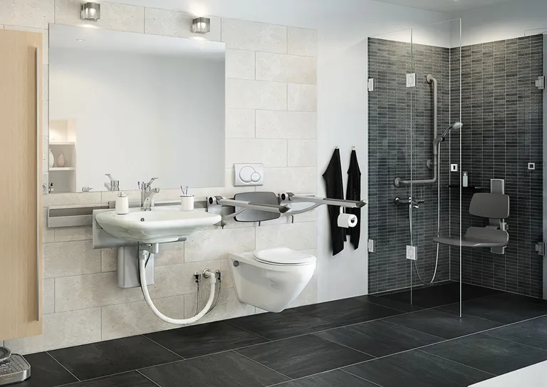 PLUS toalettstøtte, sideregulerbar